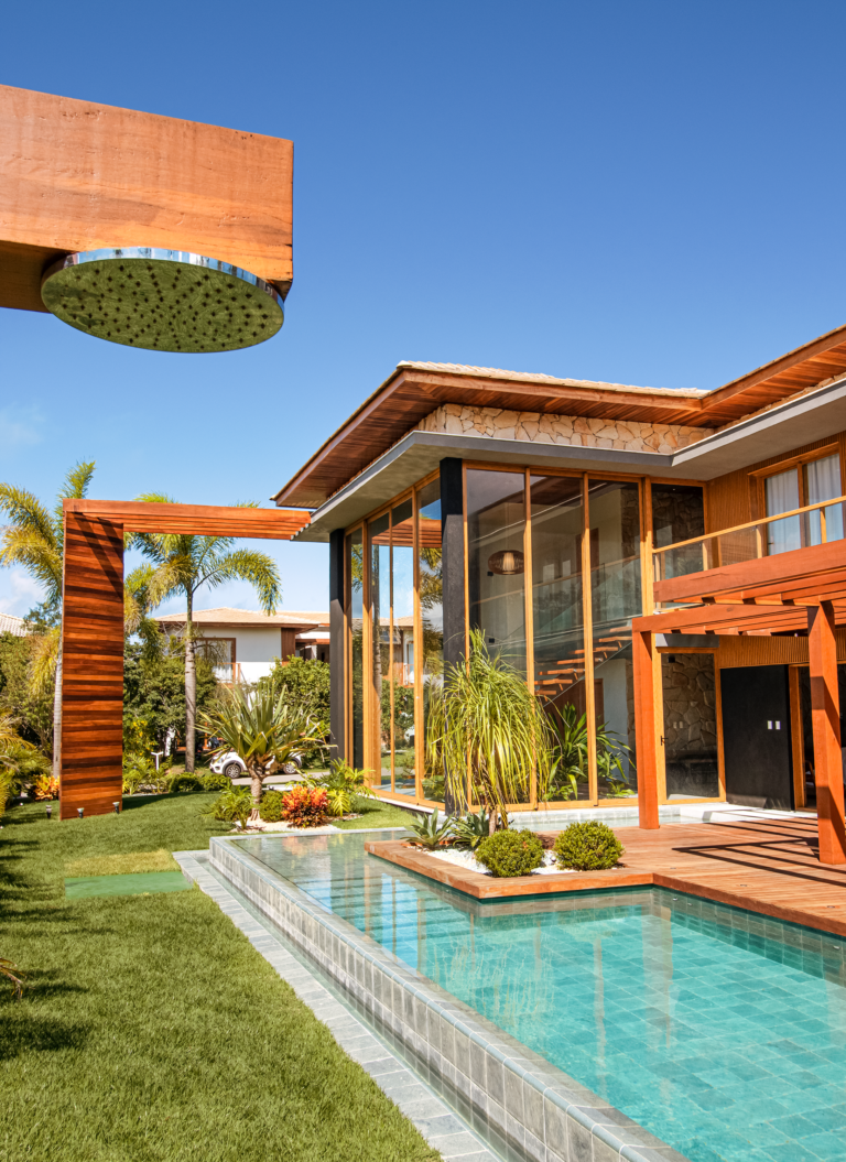 Uma Casa Escultural com Arquitetura Tropical: Integração com a Natureza e Elegância em Praia do Forte, Bahia, Brasil.